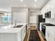 Contemporary kitchen featuring stainless appliances, a center island and hardwood floors at 3844 Albert Ln, Bargersville, IN 46106