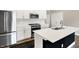 Lovely kitchen with stainless steel appliances, a large center island, and white cabinetry at 3844 Albert Ln, Bargersville, IN 46106