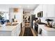Modern kitchen with white cabinets, island, and stainless steel appliances at 3844 Albert Ln, Bargersville, IN 46106