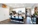 Modern kitchen with white cabinets, island, and stainless steel appliances at 3844 Albert Ln, Bargersville, IN 46106