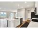 Open concept kitchen boasting a large island, stainless appliances and open view to Gathering room at 3844 Albert Ln, Bargersville, IN 46106