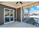 Covered patio with sliding glass door and string lights at 3844 Albert Ln, Bargersville, IN 46106