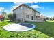A spacious, grassy backyard is perfect for outdoor play and relaxation at 386 White Oak Ln, Greenwood, IN 46142