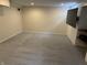 Finished basement with plush carpeting, featuring a large TV and recreational space at 386 White Oak Ln, Greenwood, IN 46142