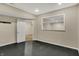 Unfinished basement space featuring an open doorway to the finished area at 386 White Oak Ln, Greenwood, IN 46142