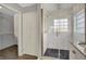 This bathroom features a tiled walk-in shower with glass enclosure and a walk in closet at 386 White Oak Ln, Greenwood, IN 46142