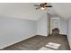 Bedroom with carpet and ceiling fan with light. Doorway to the right at 386 White Oak Ln, Greenwood, IN 46142