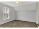 Bedroom features carpet, a window, and a simple overhead light fixture at 386 White Oak Ln, Greenwood, IN 46142