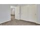 Bedroom featuring neutral walls, plush carpet, a closet, and a connecting room at 386 White Oak Ln, Greenwood, IN 46142