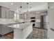 This spacious kitchen is equipped with stainless steel appliances, white countertops, and gray cabinets at 386 White Oak Ln, Greenwood, IN 46142