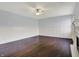 Inviting living room featuring dark hardwood floors and classic wainscoting, perfect for relaxation and entertaining at 386 White Oak Ln, Greenwood, IN 46142