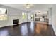 Bright living room flows into an open concept kitchen and dining area at 386 White Oak Ln, Greenwood, IN 46142