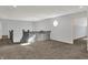 Inviting loft area with plush carpeting, offering a cozy space for relaxation and entertainment at 386 White Oak Ln, Greenwood, IN 46142