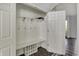 Functional mudroom with built-in bench, coat hooks, and storage cubbies, perfect for organization at 386 White Oak Ln, Greenwood, IN 46142