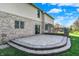 An outdoor patio provides seamless transition to green backyard at 386 White Oak Ln, Greenwood, IN 46142