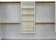 Organized walk-in closet equipped with shelves, rods, and white-painted walls at 386 White Oak Ln, Greenwood, IN 46142