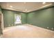 Bedroom featuring neutral carpet, fresh paint, recessed lighting, and natural light at 4232 Bunting Ln, Columbus, IN 47203