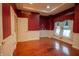 Bedroom boasts hardwood floors, fresh paint, and natural light at 4232 Bunting Ln, Columbus, IN 47203