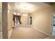 Dining room boasting elegant lighting, neutral walls, and a cozy carpet for intimate gatherings at 4232 Bunting Ln, Columbus, IN 47203