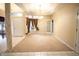 Inviting dining room featuring tray ceilings, modern lighting, and a cozy carpet, perfect for entertaining at 4232 Bunting Ln, Columbus, IN 47203