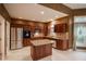 Lovely kitchen with stainless steel appliances, granite counters, an island, and stylish cabinetry at 4232 Bunting Ln, Columbus, IN 47203
