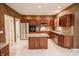 Spacious kitchen featuring granite countertops, stainless steel appliances, and a center island at 4232 Bunting Ln, Columbus, IN 47203