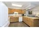 Kitchen with wood cabinets and white appliances at 4314 London Ct, Anderson, IN 46013