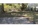 Backyard view, small fire pit, and partial patio at 4712 Caroline Ave, Indianapolis, IN 46205