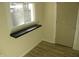 Laundry area with window, shelf, and door at 4712 Caroline Ave, Indianapolis, IN 46205