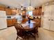 Eat-in kitchen with oak cabinets and a center island at 545 Lake Crossing Ln, Franklin, IN 46131