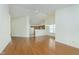 Open concept living room and kitchen with hardwood floors at 5837 Common Cir, Indianapolis, IN 46220