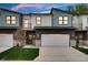 Two-story modern home with attached garage and balcony at 5870 Harbour Town Dr, Noblesville, IN 46062