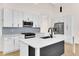 Modern kitchen featuring white cabinets and quartz countertops at 5870 Harbour Town Dr, Noblesville, IN 46062