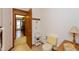 Small bathroom with toilet and access to kitchen at 710 Eagle Pkwy # 15, Brownsburg, IN 46112