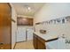 Laundry room with washer, dryer, and storage cabinets at 710 Eagle Pkwy # 15, Brownsburg, IN 46112