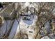 Aerial view of house with backyard, deck, and snow-covered yard at 769 Iron Bridge Rd, Cicero, IN 46034