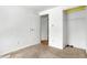 Spacious bedroom with neutral walls and carpet at 7803 Opelika Ct, Indianapolis, IN 46217