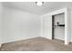 Bright bedroom featuring a double-door closet at 7803 Opelika Ct, Indianapolis, IN 46217