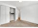 Cozy bedroom with double door closet and carpet at 7803 Opelika Ct, Indianapolis, IN 46217