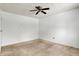 Bright bedroom with ceiling fan and neutral carpeting at 7803 Opelika Ct, Indianapolis, IN 46217