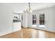 Bright dining room with hardwood floors and sliding doors to deck at 7803 Opelika Ct, Indianapolis, IN 46217