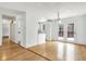 Dining room with hardwood floors and patio access at 7803 Opelika Ct, Indianapolis, IN 46217