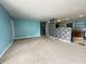 Open-concept living room with floral accents and neutral carpet at 7903 Roseway Ct, Indianapolis, IN 46226