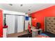 Bedroom with a gaming setup and built-in closet at 8224 Barry Rd, Indianapolis, IN 46219