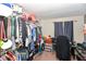 Bedroom with a large closet and a workspace at 8224 Barry Rd, Indianapolis, IN 46219
