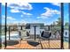 Spacious balcony with stunning city views and comfortable chairs at 855 N East St # 302, Indianapolis, IN 46202