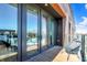 Private balcony with city views and modern seating at 855 N East St # 302, Indianapolis, IN 46202