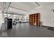 Modern fitness center with various equipment and large windows at 855 N East St # 302, Indianapolis, IN 46202