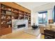 Stylish lobby featuring built-in shelving, fireplace, and comfortable seating at 855 N East St # 302, Indianapolis, IN 46202