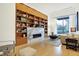 Modern lobby with a marble fireplace and built-in bookshelves at 855 N East St # 302, Indianapolis, IN 46202